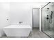 Modern bathroom featuring a soaking tub and a glass shower at 1685 S Milwaukee St, Denver, CO 80210