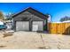 Two car detached garage featuring a basketball hoop at 1685 S Milwaukee St, Denver, CO 80210