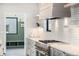Modern kitchen featuring stainless steel appliances, sleek cabinetry, and elegant countertops at 1685 S Milwaukee St, Denver, CO 80210