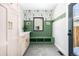 Charming mud room with built-in bench, custom storage, and stylish decor at 1685 S Milwaukee St, Denver, CO 80210