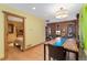 Bright dining area with hardwood floors, connecting to the living space and a bedroom, perfect for gatherings at 3313 Curtis St, Denver, CO 80205