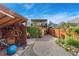 Backyard view of home featuring a shed, patio and two-story floor plan at 3313 Curtis St, Denver, CO 80205