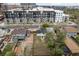 An aerial view of the property with a fenced backyard near an apartment complex at 13438 E 13Th Pl, Aurora, CO 80011