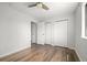 Spacious bedroom with hardwood floors and ample closet space at 13438 E 13Th Pl, Aurora, CO 80011