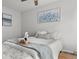 Cozy bedroom with elegant decor, ceiling fan, and natural light at 13438 E 13Th Pl, Aurora, CO 80011