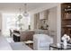 Elegant kitchen featuring a large island, pendant lighting, and stainless steel appliances at 4131 Quivas St, Denver, CO 80211