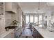 Modern kitchen with stainless steel appliances, lots of cabinets and seamless flow to outdoor living at 4131 Quivas St, Denver, CO 80211