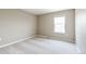 Cozy bedroom with neutral carpet, light walls, and bright natural light at 18399 Field Mint Pt, Parker, CO 80134