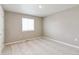 Cozy bedroom with neutral carpet, light walls, and bright natural light at 18399 Field Mint Pt, Parker, CO 80134