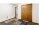 Basement bedroom features a closet and doorway leading to additional space at 1591 S Zuni St, Denver, CO 80223