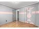 Nicely sized bedroom featuring hardwood floors, fresh paint and a spacious closet at 1591 S Zuni St, Denver, CO 80223