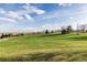 Tranquil green space with mature trees, offering a serene escape within a picturesque park setting at 1591 S Zuni St, Denver, CO 80223