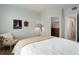 Relaxing bedroom with a comfy chair and ample closet space, creating a serene retreat at 8500 E Jefferson Ave # 3H, Denver, CO 80237