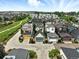 A picturesque aerial view of modern homes featuring well-maintained yards and a serene neighborhood at 1376 Snowberry Ln, Louisville, CO 80027