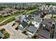 Wide aerial view of a residential neighborhood displaying diverse home styles and tree-lined streets at 1376 Snowberry Ln, Louisville, CO 80027