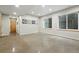 Finished basement with polished concrete floors and egress windows for natural light at 1376 Snowberry Ln, Louisville, CO 80027