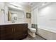 Bathroom features a modern vanity, white subway tile, and a shower and tub combo at 1376 Snowberry Ln, Louisville, CO 80027