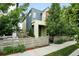 Stylish two-story home with a modern design, xeriscaped front yard, and inviting entry at 1376 Snowberry Ln, Louisville, CO 80027