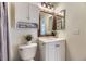 Bright bathroom featuring a vanity with a sink, and a shower/tub combination at 7822 S Kittredge Cir, Englewood, CO 80112