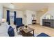 Cozy living room with hardwood floors, fireplace, and comfortable seating area at 7822 S Kittredge Cir, Englewood, CO 80112