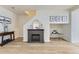 Inviting living room showcases a fireplace, contemporary décor, and staircase access at 7822 S Kittredge Cir, Englewood, CO 80112