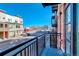 Balcony view of neighborhood with seating and black railings at 3500 S Corona St # 205, Englewood, CO 80113