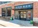 Attractive building entrance with brick facade and modern architectural details at 3500 S Corona St # 205, Englewood, CO 80113