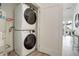 Conveniently located laundry closet with stacked washer and dryer at 3500 S Corona St # 205, Englewood, CO 80113