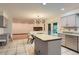 Spacious kitchen featuring an island and stainless steel appliances, perfect for culinary enthusiasts at 8075 S Harrison Way, Centennial, CO 80122