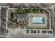 A high angle view of the community pool and surrounding grounds and parking at 9568 W San Juan Cir # 203, Littleton, CO 80128