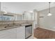 Stylish kitchen featuring granite countertops and stainless steel appliances at 9568 W San Juan Cir # 203, Littleton, CO 80128