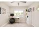 Versatile bedroom features a work-from-home setup, bright natural light, and neutral tones for a calming atmosphere at 2027 S Welch Cir, Lakewood, CO 80228