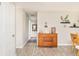 Hallway featuring a wooden dresser and stylish decor at 2027 S Welch Cir, Lakewood, CO 80228