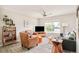 Bright living room with a ceiling fan and comfortable seating at 2027 S Welch Cir, Lakewood, CO 80228