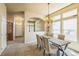 Dining room featuring modern decor, natural light and seamless flow to other areas at 1404 Tonkin Pl, Longmont, CO 80504