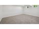 Unfinished basement featuring neutral carpet and great natural light at 280 Ammons St, Lakewood, CO 80226