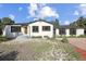 Lovely single-Gathering home featuring a modern front door and fresh exterior paint at 280 Ammons St, Lakewood, CO 80226