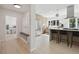 Bright kitchen with stainless steel appliances, island with seating, and stylish cabinets at 280 Ammons St, Lakewood, CO 80226
