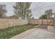 Spacious, fenced backyard with green grass, perfect for outdoor activities and relaxation at 3930 W Kentucky Ave, Denver, CO 80219