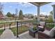 Inviting patio with outdoor seating, providing a relaxing space with picturesque neighborhood views at 655 Stonebridge Dr, Longmont, CO 80503