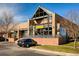 Commercial building exterior with a modern architectural design, showcasing large windows and a prominent 'PROTO'S' sign at 655 Stonebridge Dr, Longmont, CO 80503