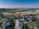 Beautiful aerial view of the house, community, and surrounding areas with trail, lake and clubhouse at 27235 E Lakeview Pl, Aurora, CO 80016