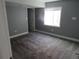 Finished basement bedroom with carpet and natural light at 25858 E Bayaud Ave, Aurora, CO 80018