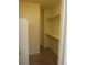 Walk-in closet with carpeted floor and a closet organization system at 25858 E Bayaud Ave, Aurora, CO 80018