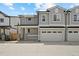 Charming two-story home featuring a porch and attached garage in a modern design at 4020 Upham St, Wheat Ridge, CO 80033