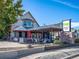 Quaint exterior view of Clancy's Irish Pub, featuring outdoor seating and classic pub signage at 4020 Upham St, Wheat Ridge, CO 80033