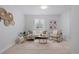 Cozy living room with neutral decor, stylish rug, comfortable seating, and ample natural light at 4020 Upham St, Wheat Ridge, CO 80033