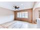 Comfortable living area with a ceiling fan and a bright window at 13744 Columbine St, Thornton, CO 80602