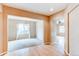 Spacious living room with hardwood and carpet flooring and natural light at 13744 Columbine St, Thornton, CO 80602