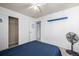 Clean bedroom featuring neutral carpet, a ceiling fan, a bed, closet and a window at 291 Las Lomas St, Brighton, CO 80601